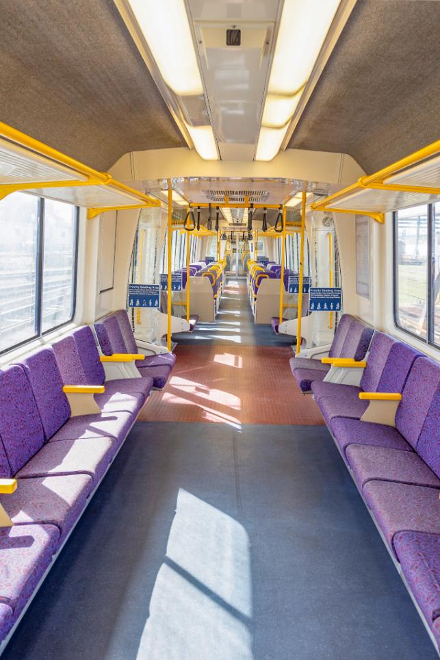 Inside view of aisle and seats in an IMU 100 carriage