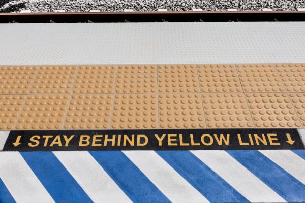 yellow safety line at a station