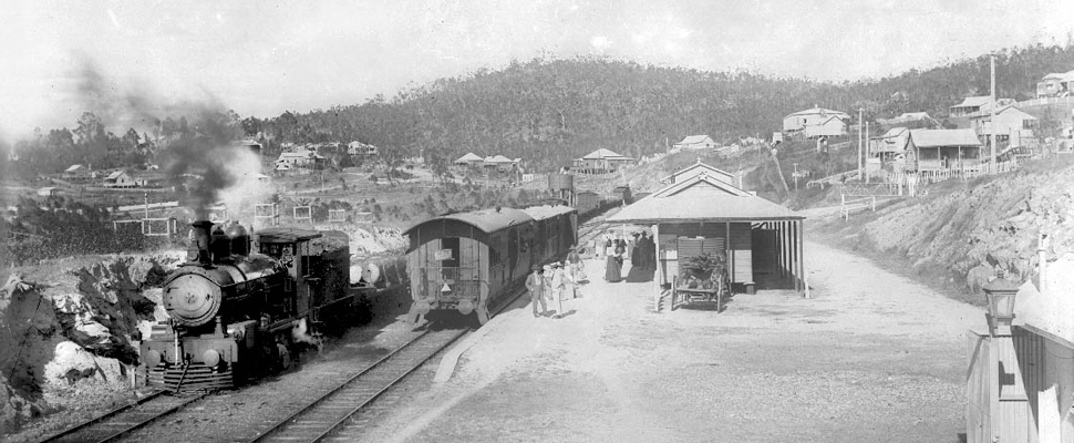 A photograph shows the original timber Herberton railway station, full image description is available below. 