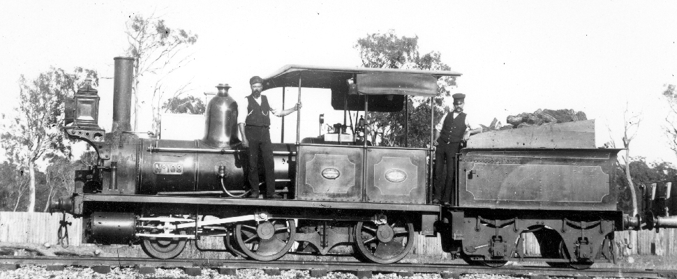 A​ black and white photograph shows a steam locomotive numbered 108. The photograph was taken in the 1890’s, full image description is available below.