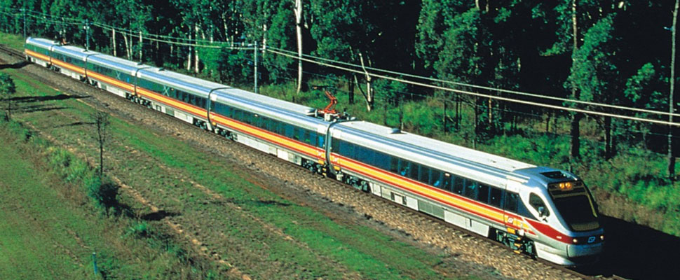  A colour photograph of the electric tilt train that commenced operation between Brisbane and Rockhampton in 1998,full image description is available below. 